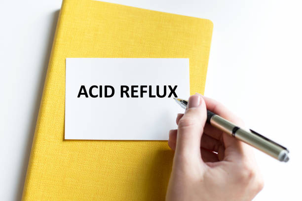 istock ACID REFLUX text written in card. Medical concept. 1440450112