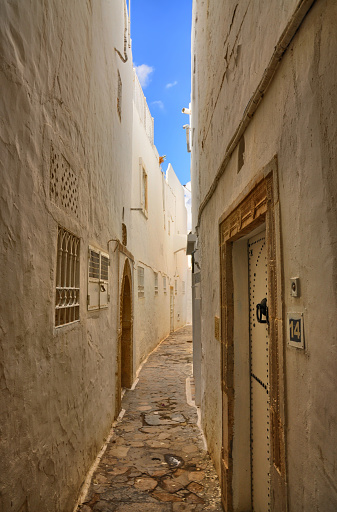 Narrow street of ancient Medina in Hammamet, Tunisia, Mediterranean Sea, Africa, HDR