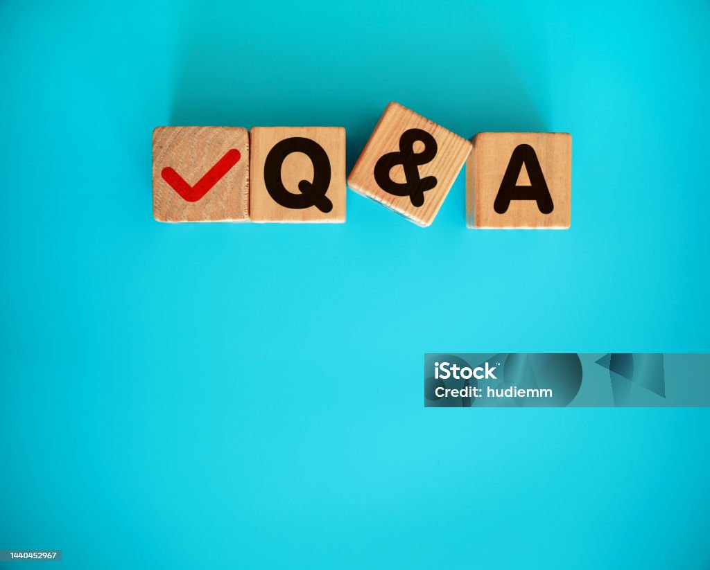 Q&A with toy block on blue background Q and A on the wooden toy blocks with letters on blue background. Concept word forming with cube on background - questions and answers Advertisement Stock Photo