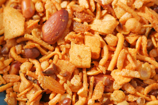 istock Bombay mix or Chiwda on yellow background 1440456881