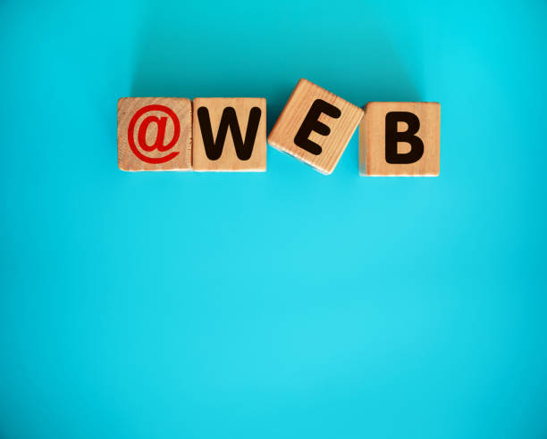 istock WEB alphabet letter with toy block on blue background 1440458610