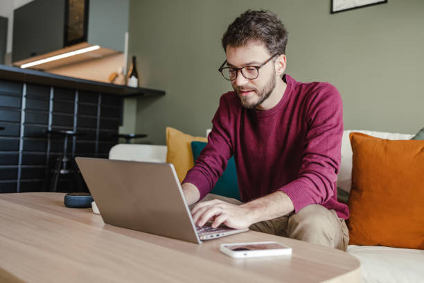 istock Relaxing free time at home with a laptop 1440459435