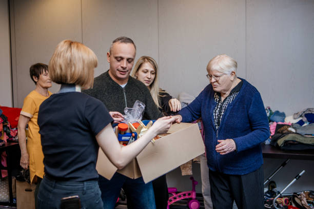 A community care giver volunteering at a refugee centre