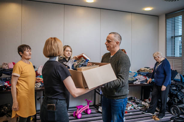 istock A community care giver volunteering at a refugee centre 1440464418