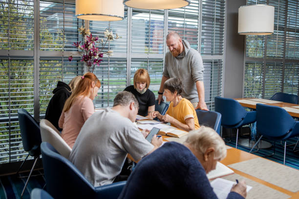 istock A community care giver volunteering at a refugee learning centre 1440464608