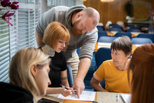 istock A community care giver volunteering at a refugee learning centre 1440464637