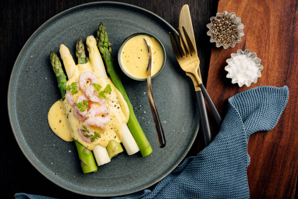 istock Asparagus With Prawns and a Hollandaise Sauce. 1440464710