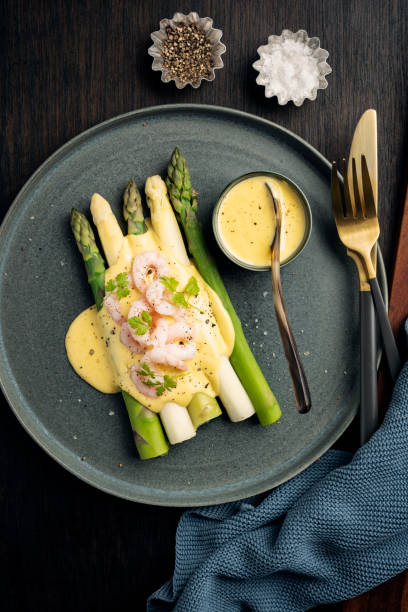 istock Asparagus With Prawns and a Hollandaise Sauce. 1440464961
