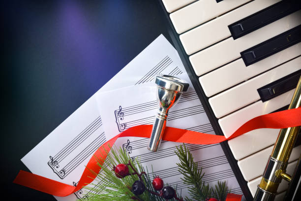 istock Christmas music concert concept with piano and wind instruments 1440466052