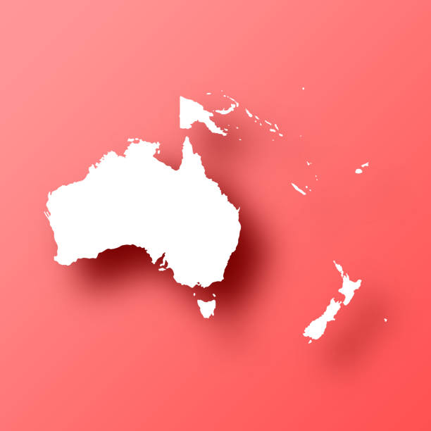 mapa oceanii na czerwonym tle z cieniem - australia map cartography three dimensional shape stock illustrations