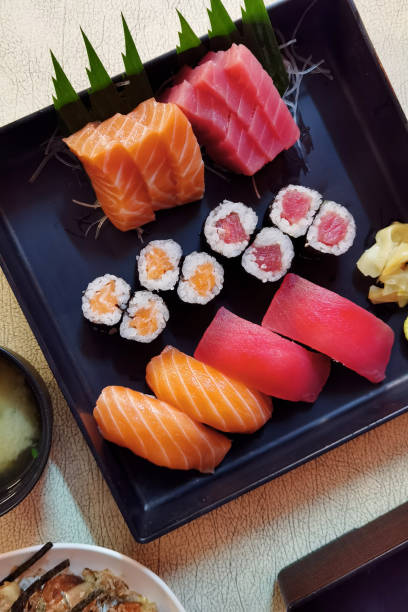 istock Closeup of fresh sushi on ceramic dish 1440467518