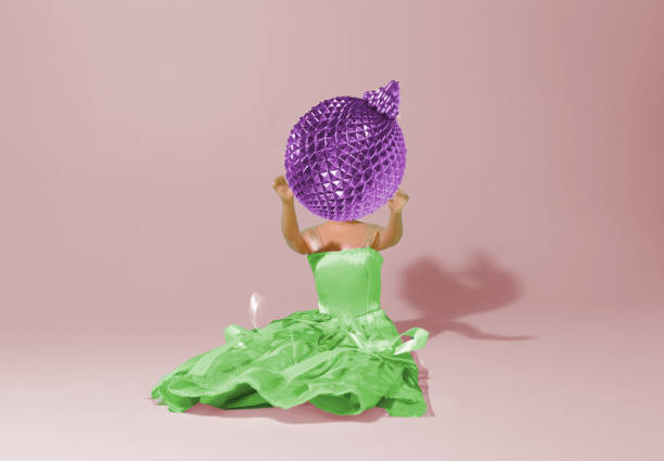 doll throws purple decoration ball, creative art holiday concept