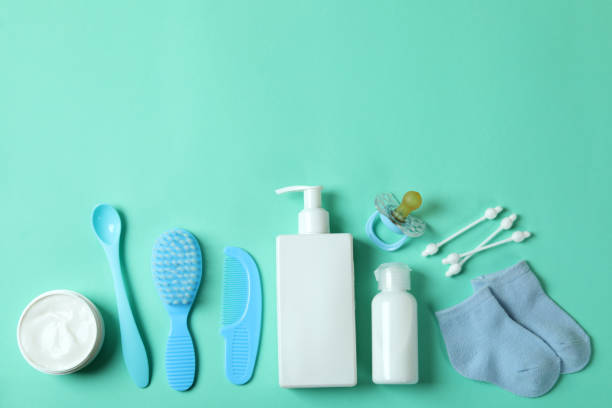istock Different baby hygiene accessories on mint background 1440469495