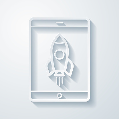 istock Tablet PC with rocket. Icon with paper cut effect on blank background 1440470695