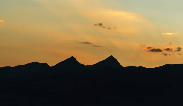 istock beautiful nature, sunset, mountain silhouette 1440474254