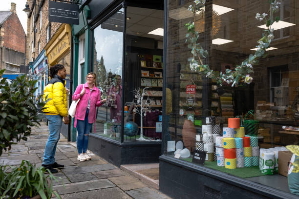istock Friends Looking Through Shop Windows 1440474506