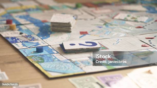 Board Game On The Floor Ready To Play Stock Photo - Download Image Now - Board Game, Game Night - Leisure Activity, Playing Card
