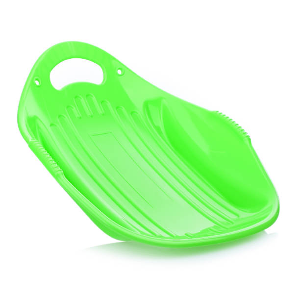 istock Children's plastic sled isolated on a white background. Sleds for skiing downhill in winter. Children's toys. Slide board 1440479166