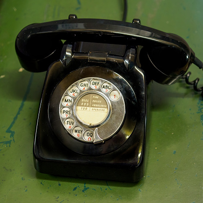 Antique telephone isolated on white background.