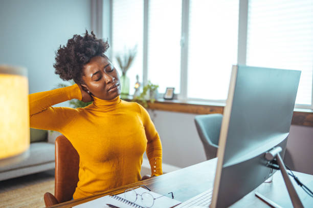 istock Young Businesswoman Suffering From Neckache. 1440483008