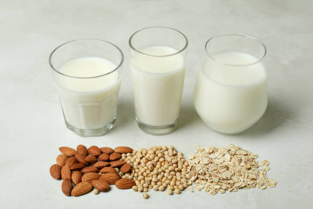 istock Concept of vegan milk on white textured background 1440484257