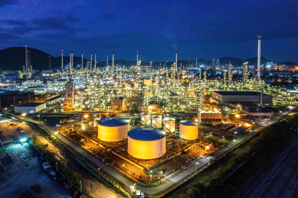 istock Oil industry district with Twilight. 1440487722