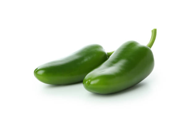 istock Green hot peppers isolated on white background 1440488217