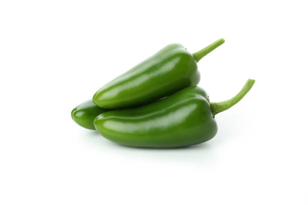 istock Green hot peppers isolated on white background 1440488597