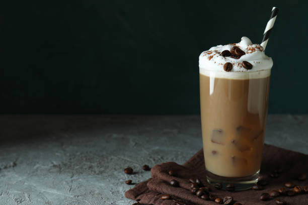 istock Concept of delicious drink with ice coffee on gray textured table 1440489743