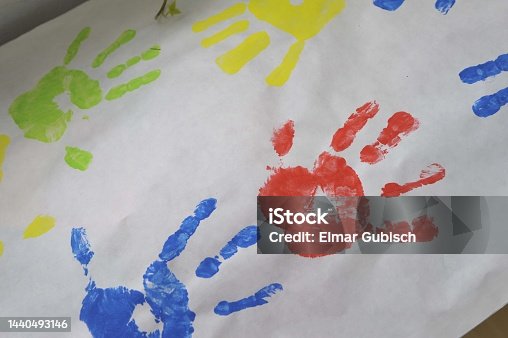 istock hand of a child, symbol for youth 1440493146