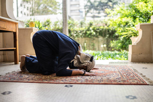 istock Young muslim man praying 1440493485