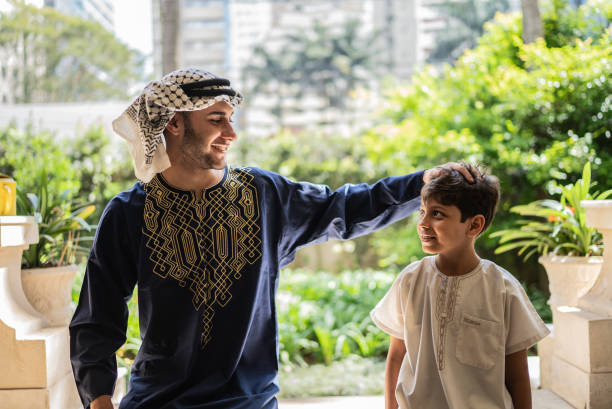 Young man praising his younger brother