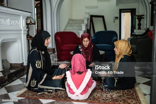 Muslim Women Praying At Home Stock Photo - Download Image Now - 10-11 Years, 35-39 Years, 45-49 Years
