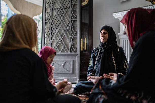 istock Muslim women praying at home 1440494246