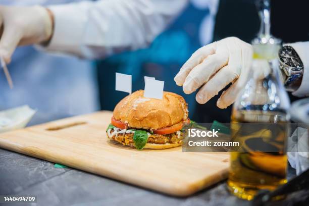Serving Prepared And Labeled Veggie Burger On Wooden Board Stock Photo - Download Image Now