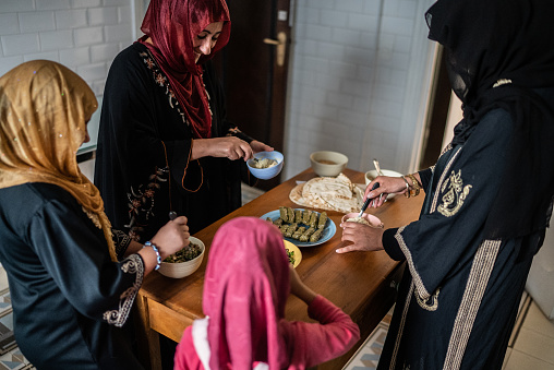 Islamic women preparing food at home