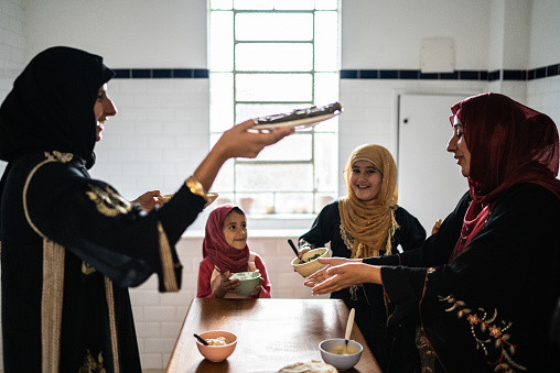 Islamic women preparing food at home