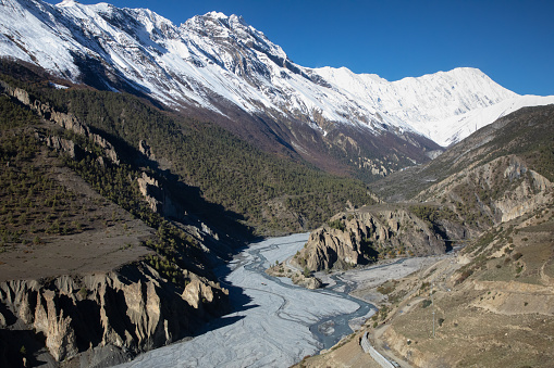 Aerial view of a road running through the valleys of Cajon del Maipo in central Chile Andes