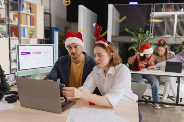 istock Business people working during Christmas time 1440498806