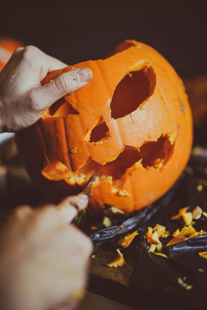 istock Carved scary pumpkin Halloween decoration 1440498856