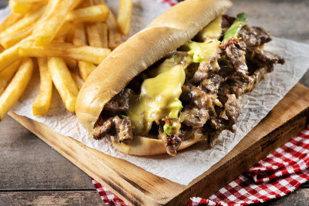 istock Philly cheesesteak sandwich with beef, cheese,green pepers and caramelized onion isolated on white background. 1440499165