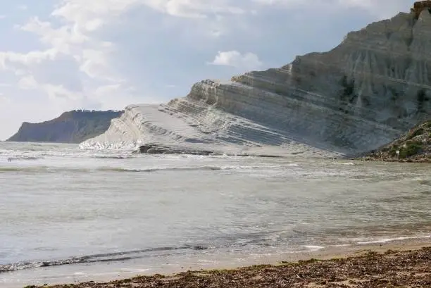 Photo of Scala dei Turchi, natural white limestone stairs. Popular tourist attraction close to Agrigento, Sicily, Italy.