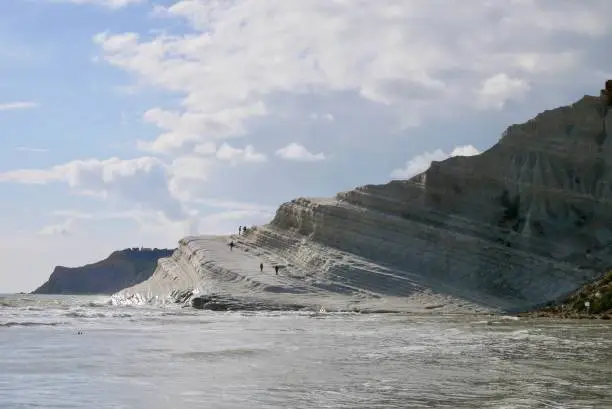 Photo of Scala dei Turchi, natural white limestone stairs. Popular tourist attraction close to Agrigento, Sicily, Italy.