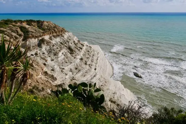 Photo of Scala dei Turchi, natural white limestone stairs. Popular tourist attraction close to Agrigento, Sicily, Italy.