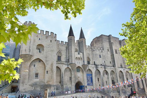 Facade of the Popes' Palace of Avignon, France. This 15,000m2 masterpiece is the largest medieval fortress and biggest gothic palace of Europe.