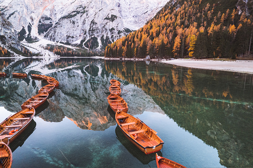 Lago di Braies Pragser Wildsee Drone Aerial Italy Boats and reflection. High quality photo