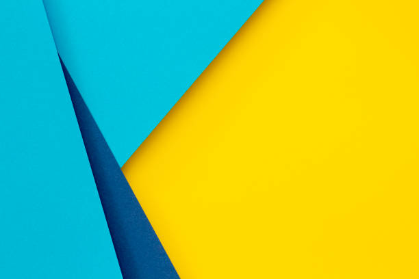 istock Abstract color papers geometry flat lay composition background with blue and yellow tones 1440514042