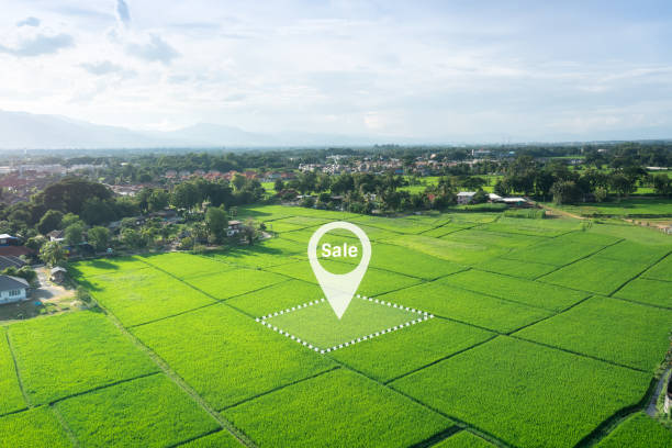istock Land plot in aerial view with concept for sale. 1440520585