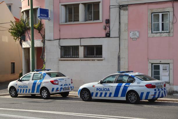 Portugal Police PSP in Lisbon Dacia and BMW cars of Portugal Police. The full name of the Portugese force is Public Security Police (PSP). psp stock pictures, royalty-free photos & images