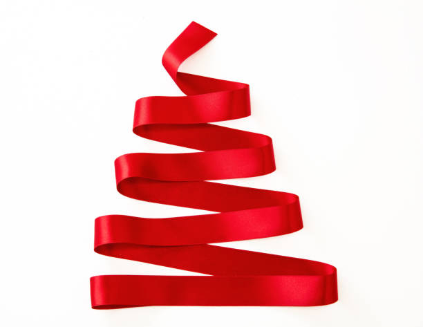 istock Christmas tree shape red ribbon isolated on white. Holiday decoration. 1440527534